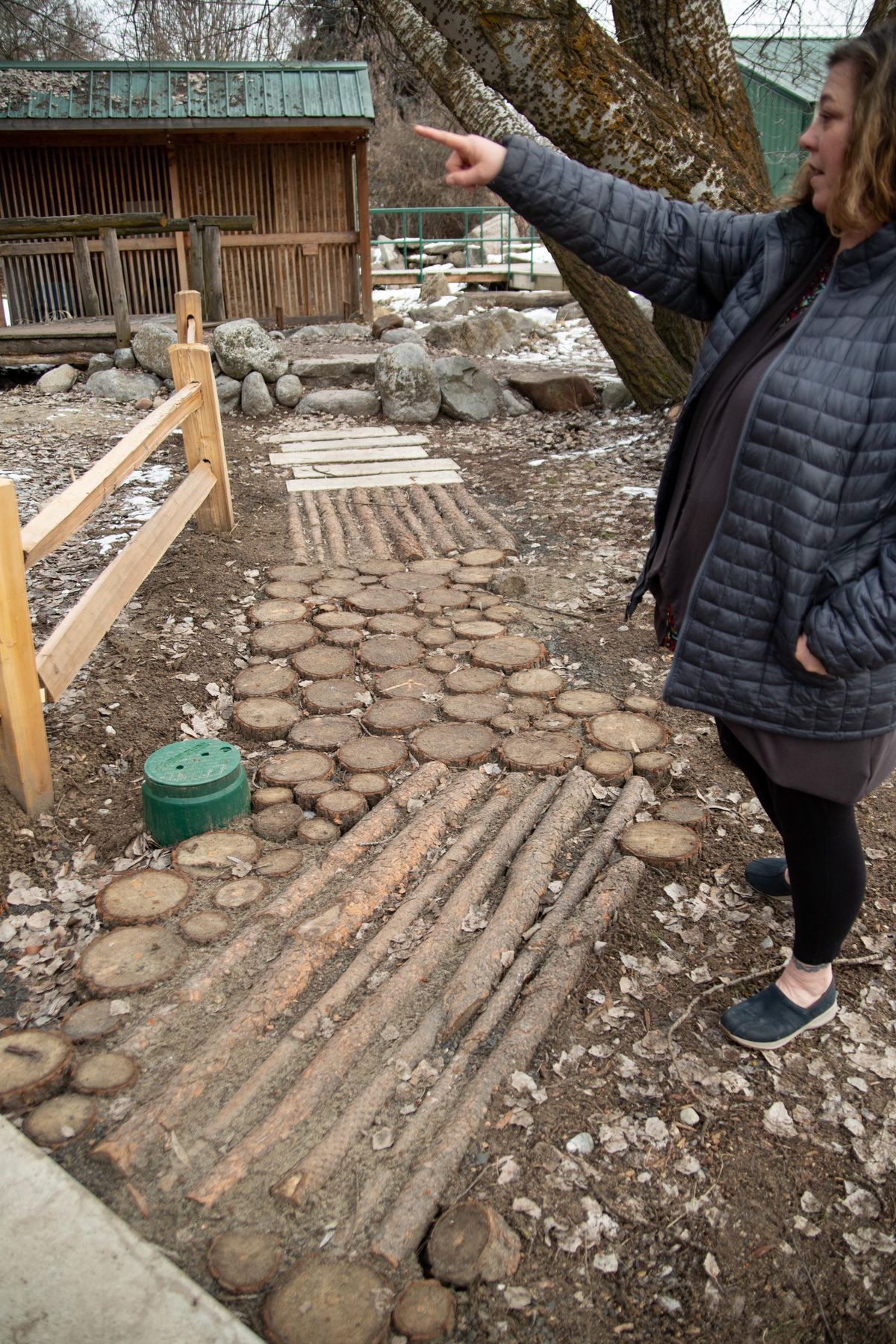 Jami Ostby Marsh, director at the West Valley Outdoor Learning Center, describes how children utilize a newly constructed trail area on Monday, Jan. 28, 2019. (Libby Kamrowski / The Spokesman-Review)
