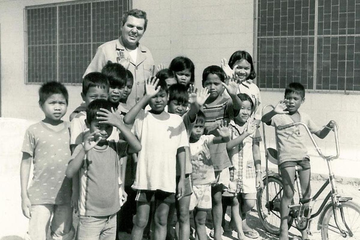 The Rev. Ray Brennan is seen with Thai children. Brennan opened a children’s orphanage in Pattaya City, Thailand, that has grown to about 850 children. (Redemptorist Denver Province Archives)