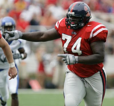 Associated Press Mississippi left tackle Michael Oher has overcome long odds as he nears completion of his degree. (Associated Press / The Spokesman-Review)