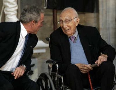President Bush talks with Dr. Michael DeBakey, 99, a famed heart surgeon, Wednesday on Capitol Hill in Washington. Associated Press
 (Associated Press / The Spokesman-Review)