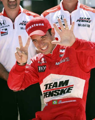 
Helio Castroneves holds up seven fingers after setting an IndyCar Series record.Associated Press
 (Associated Press / The Spokesman-Review)