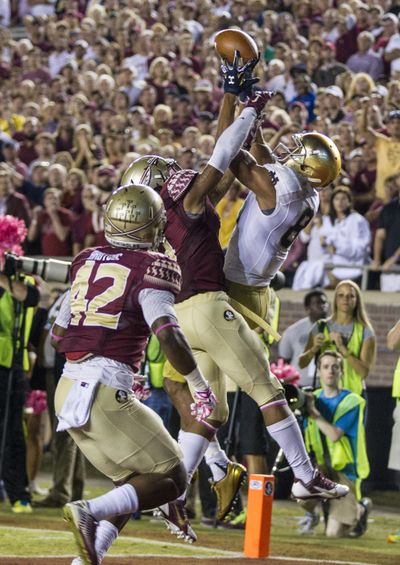 This pass intended for Notre Dame’s Corey Robinson was broken up in the end zone by Florida State defensive back Ronald Darby. Later in the drive, Robinson caught a pass for an apparent go-ahead touchdown but it was waved off by a penalty. (Associated Press)