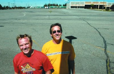 
Adam Parker, left, and Doug Miller will launch Spokane Park 'n Swap in the parking lot of the former Newport Cenemas. 
 (Jed Conklin / The Spokesman-Review)