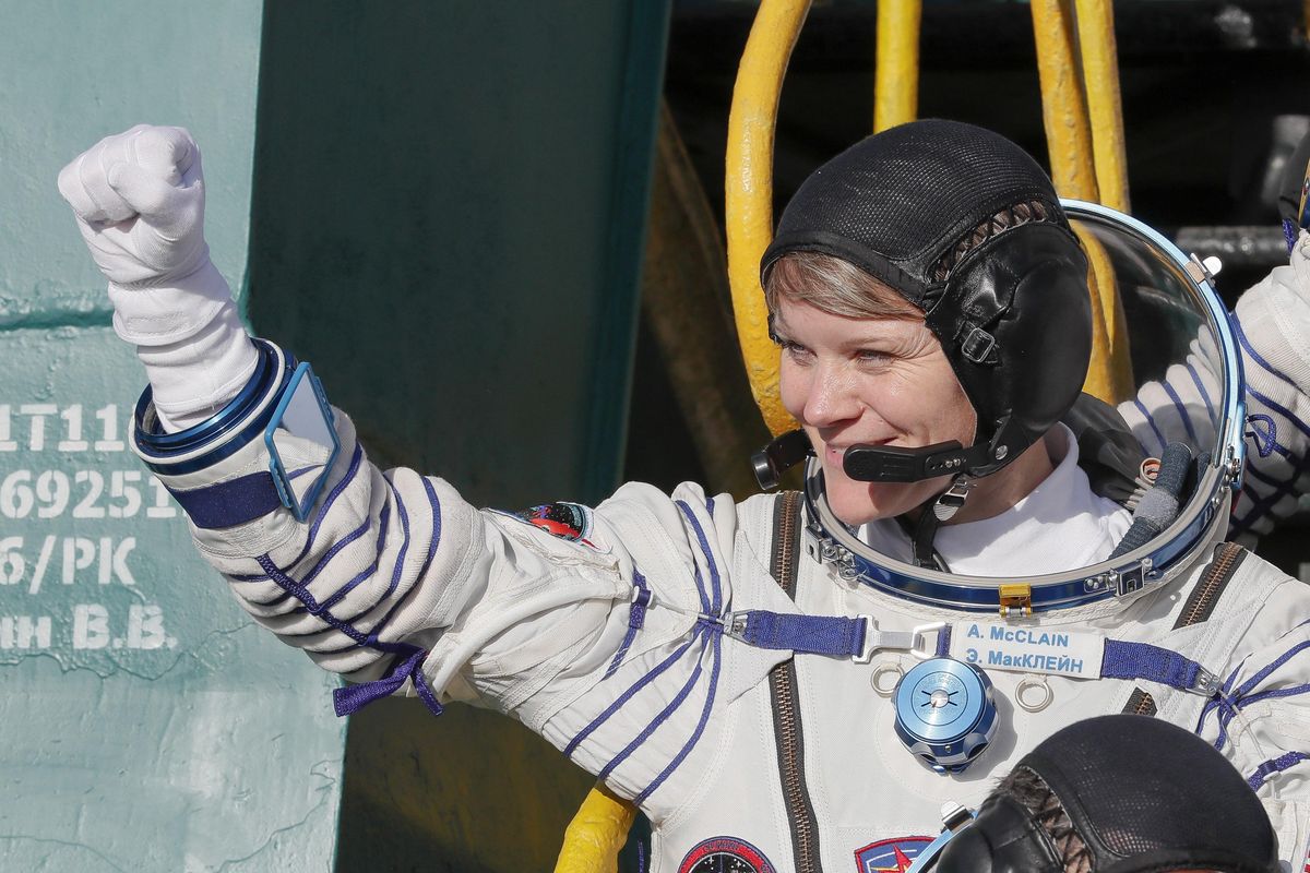 U.S. astronaut Anne McClain, crew member of the mission to the International Space Station, ISS, waves as she boards to the rocket prior to the launch of Soyuz-FG rocket at the Russian leased Baikonur cosmodrome, Kazakhstan, Monday, Dec. 3, 2018. (Shamil Zhumatov / Associated Press)