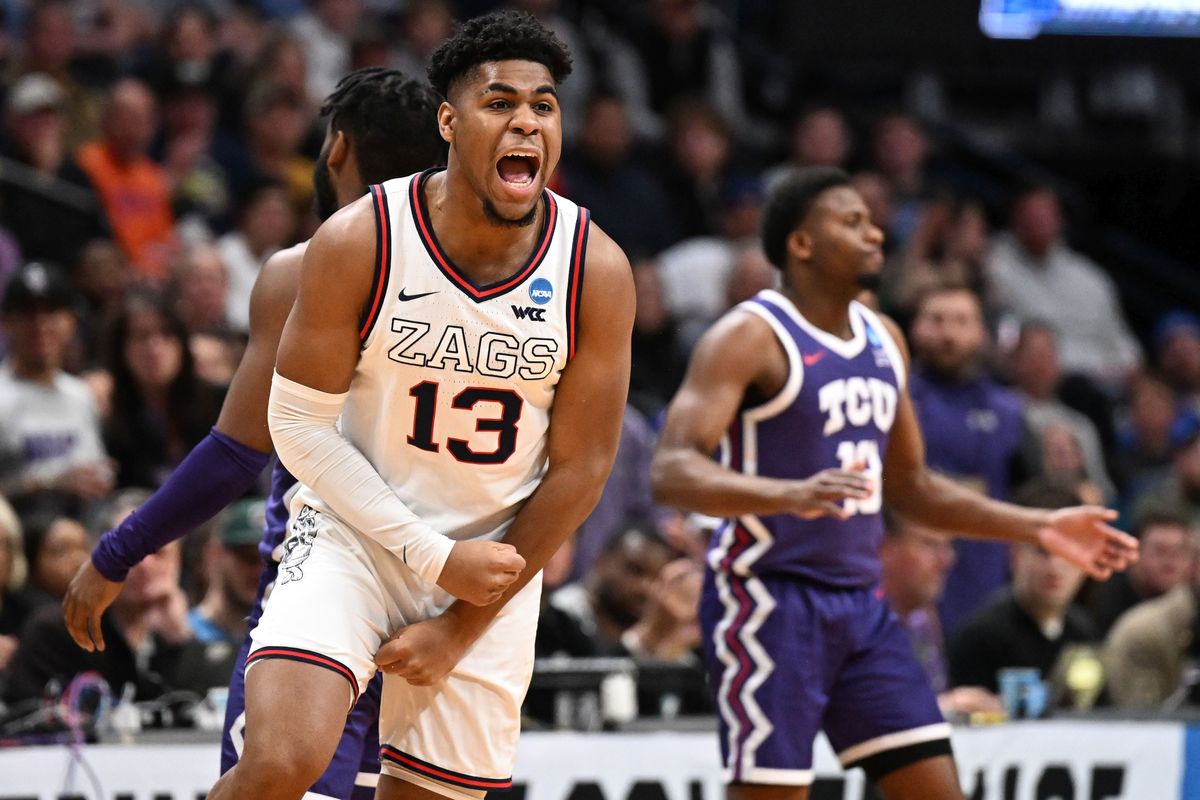 Gonzaga Bulldogs guard Malachi Smith (13) celebrates during the second half of a second round NCAA Basketball Tournament game against the TCU Horned Frogs on Sunday, March 19, 2023, at Ball Arena in Denver, Colo. Gonzaga won the game 84-81.  (Tyler Tjomsland / The Spokesman-Review)