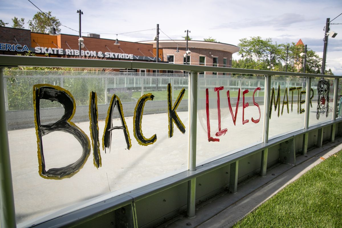 Hand-painted sections of the Numerica Skate Ribbon are seen during the Candlelight Vigil to End Police Brutality on June 28, 2020 at the corner of Riverfront Park across from Spokane City Hall. The vigil comes one day before Spokane City Council will vote on the police guild