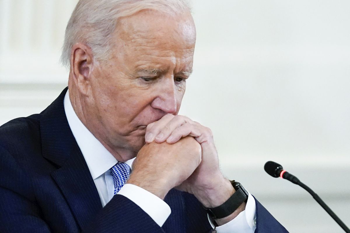 In this Sept. 24, 2021 photo, President Joe Biden listens during the Quad summit in the East Room of the White House. President Joe Biden