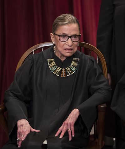 Associate Justice Ruth Bader Ginsburg joins other justices of the U.S. Supreme Court for an official group portrait at the Supreme Court Building in Washington on June 1, 2017. The oldest sitting justice at age 84, Ginsburg was appointed by President Bill Clinton in 1993. (J. Scott Applewhite / Associated Press)