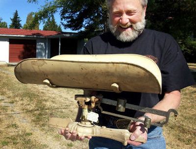 
Jerel Rowe, of Newman Lake, shows off the antique baby scale he purchased for $45 at the Farm Chicks antique sale in Fairfield. 
 (Kathryn Stevens / The Spokesman-Review)