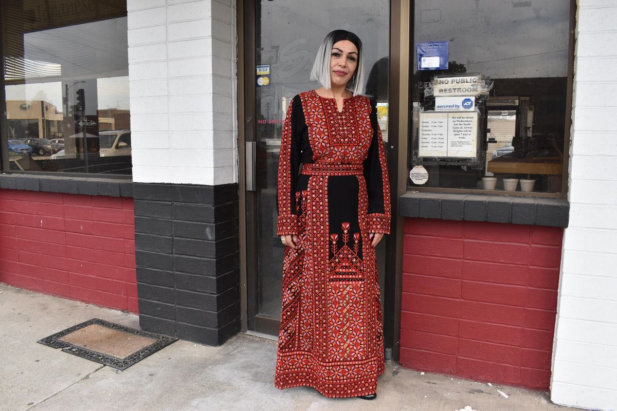 Maisa Abudayha is a chef who emigrated from Jordan to Spokane with her husband and four children in 2013. She is pictured here Sept. 7 at the former Sushi Yama downtown and has been working as a bilingual specialist for Spokane Public Schools. (Don  Chareunsy / The Spokesman-Review)