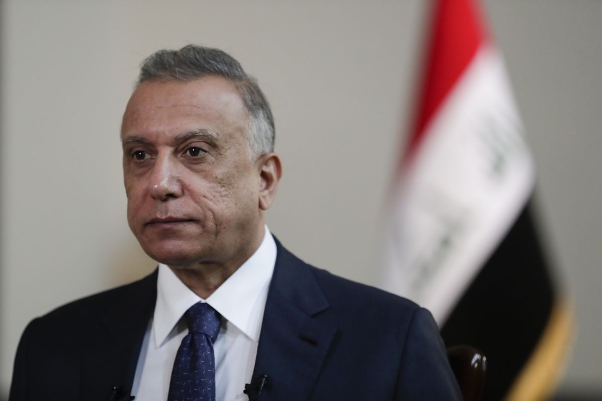Iraqi Prime Minister Mustafa al-Kadhimi poses in his office during an interview with The Associated Press in Baghdad, Iraq, Friday, July 23, 2021.  (Khalid Mohammed)