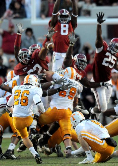 Alabama’s Terrence Cody (62) blocks a field-goal attempt by Vols’ Daniel Lincoln. (Associated Press / The Spokesman-Review)