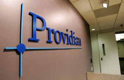 The Providian logo is on the wall at their corporate headquarters in San Francisco.  
 (Associated Press / The Spokesman-Review)