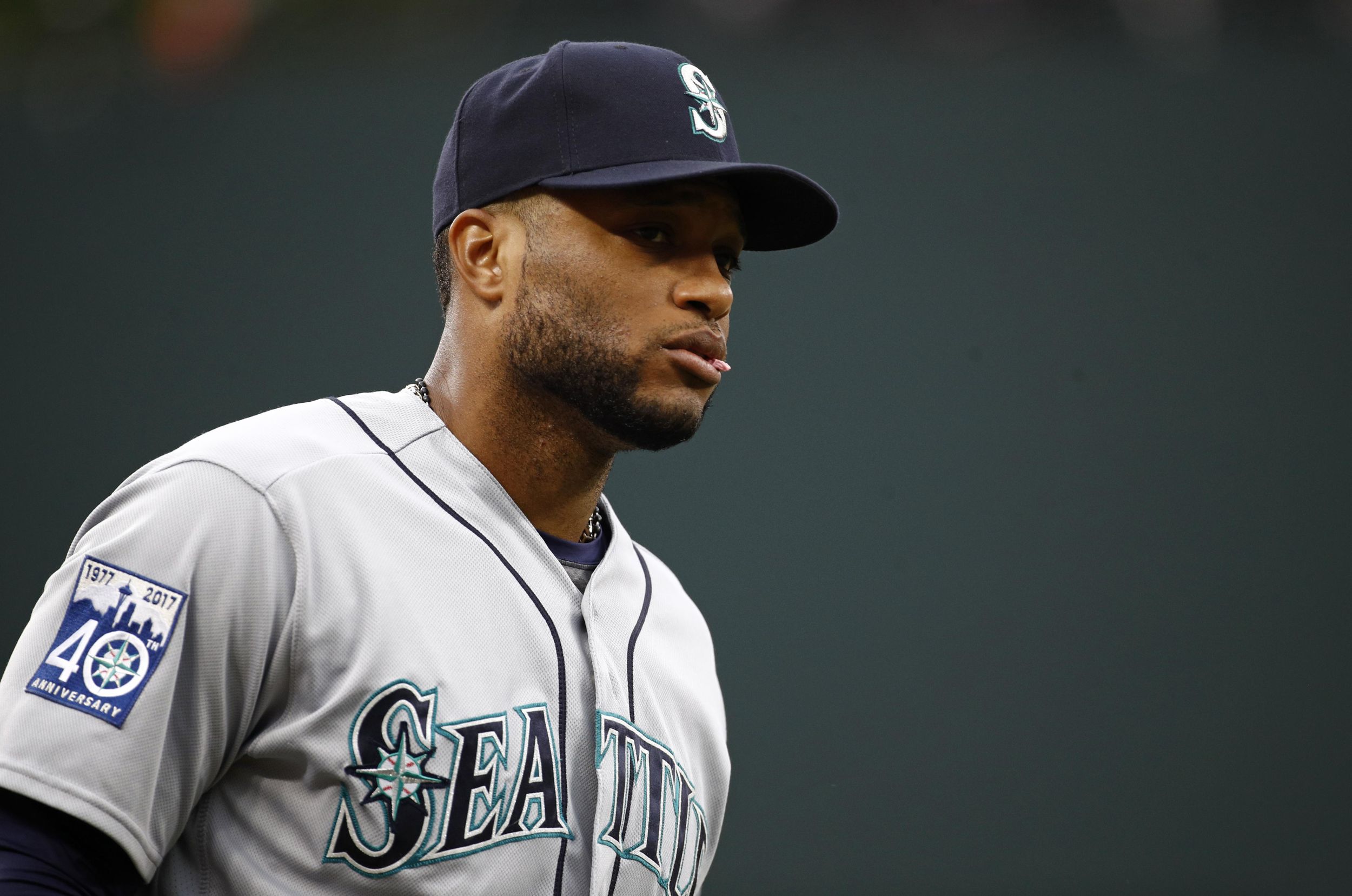 In return to baseball, Robinson Cano plays first base for Tacoma Rainiers,  has a hit