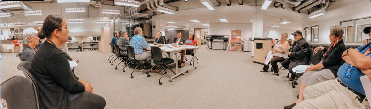 Political party observers in Pierce County watch a meeting of the canvassing board during a recent election.  (Photo courtesy of the Pierce County Auditor’s Office)