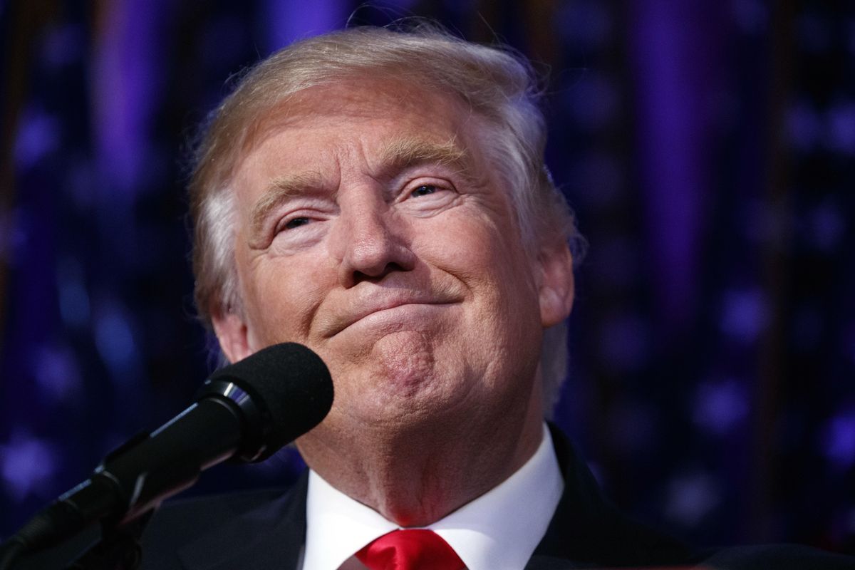 In this Nov. 9, 2016, file photo, President-elect Donald Trump smiles as he arrives to speak at an election night rally, Wednesday in New York. Donald Trump enters the White House on Jan. 20 just as he entered the race for president: defiant, unfiltered, unbound by tradition and utterly confident in his chosen course. (Evan Vucci / AP)