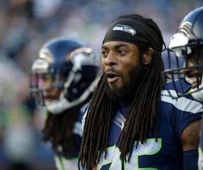 In this Aug. 18, 2016, file photo, Seattle Seahawks cornerback Richard Sherman stands on the sideline before a preseason NFL football game against the Minnesota Vikings in Seattle. Sherman was the center of attention at a Las Vegas craps table last week. (AP Photo/Elaine Thompson, File)