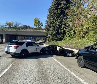 On Interstate 90 on Washington’s Mercer Island, law enforcement Saturday stopped a Mercedes that had been reported stolen.  (Courtesy of Washington State Patrol)