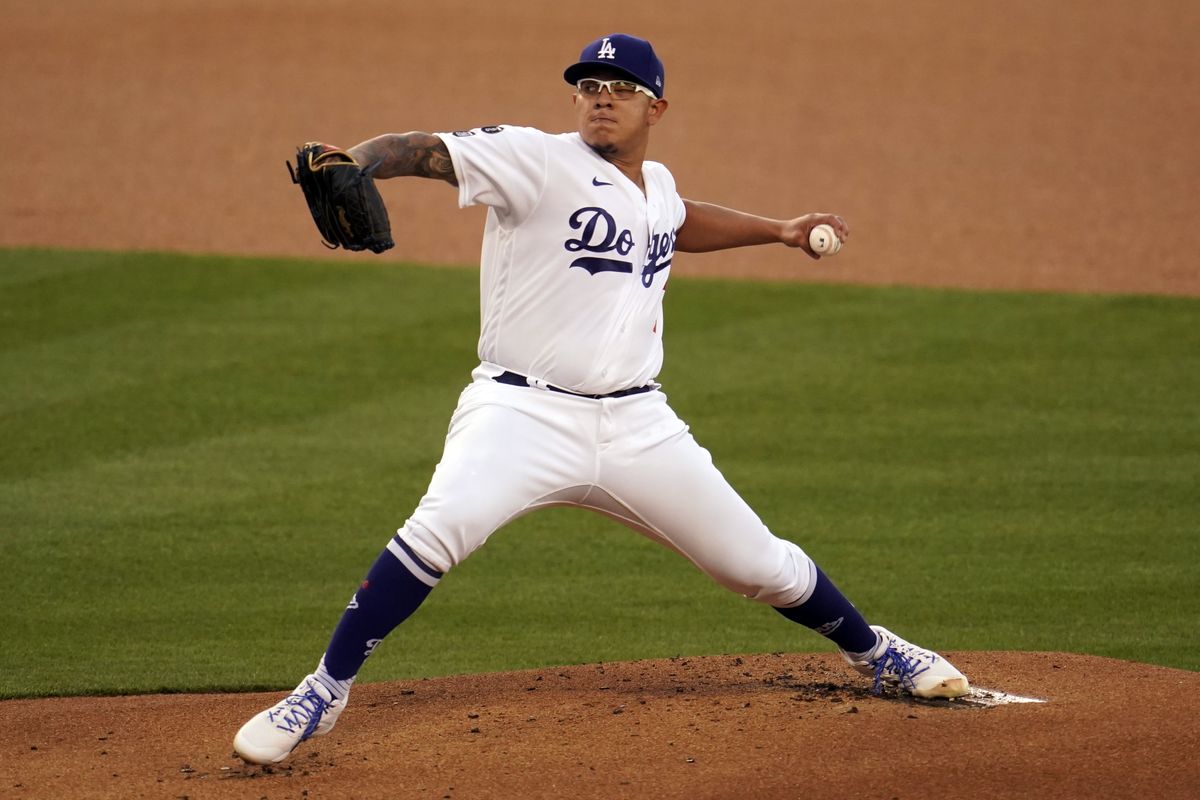 Los Angeles Dodgers starting pitcher Julio Urias throws to a Seattle Mariners batter during the first inning of a baseball game Wednesday, May 12, 2021, in Los Angeles.  (Associated Press)