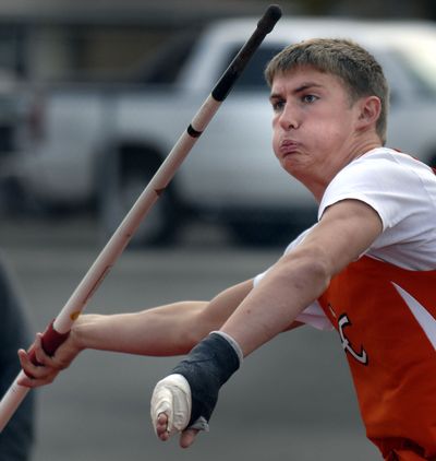 Lewis and Clark graduate Joe Zimmerman was almost a Cougar, but ended up a Husky. He will compete in Pullman today at the schools’ dual meet.  (File)