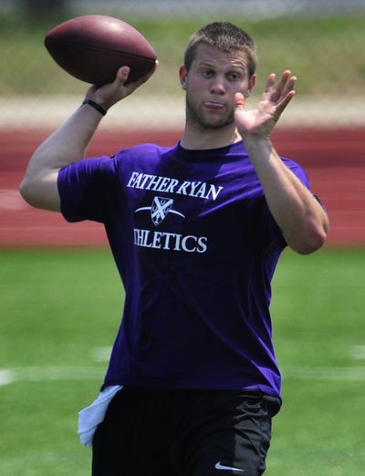 Former Washington quarterback Jake Locker passes during the Titans’ player-organized workout. (Associated Press)