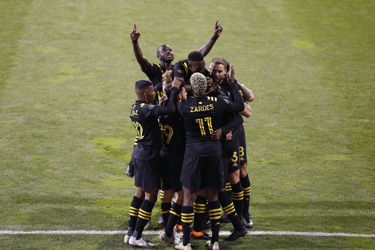 Columbus Crew players celebrate a goal against the Seattle Sounders during the first half of the MLS Cup Saturday in Columbus, Ohio.  (Associated Press)
