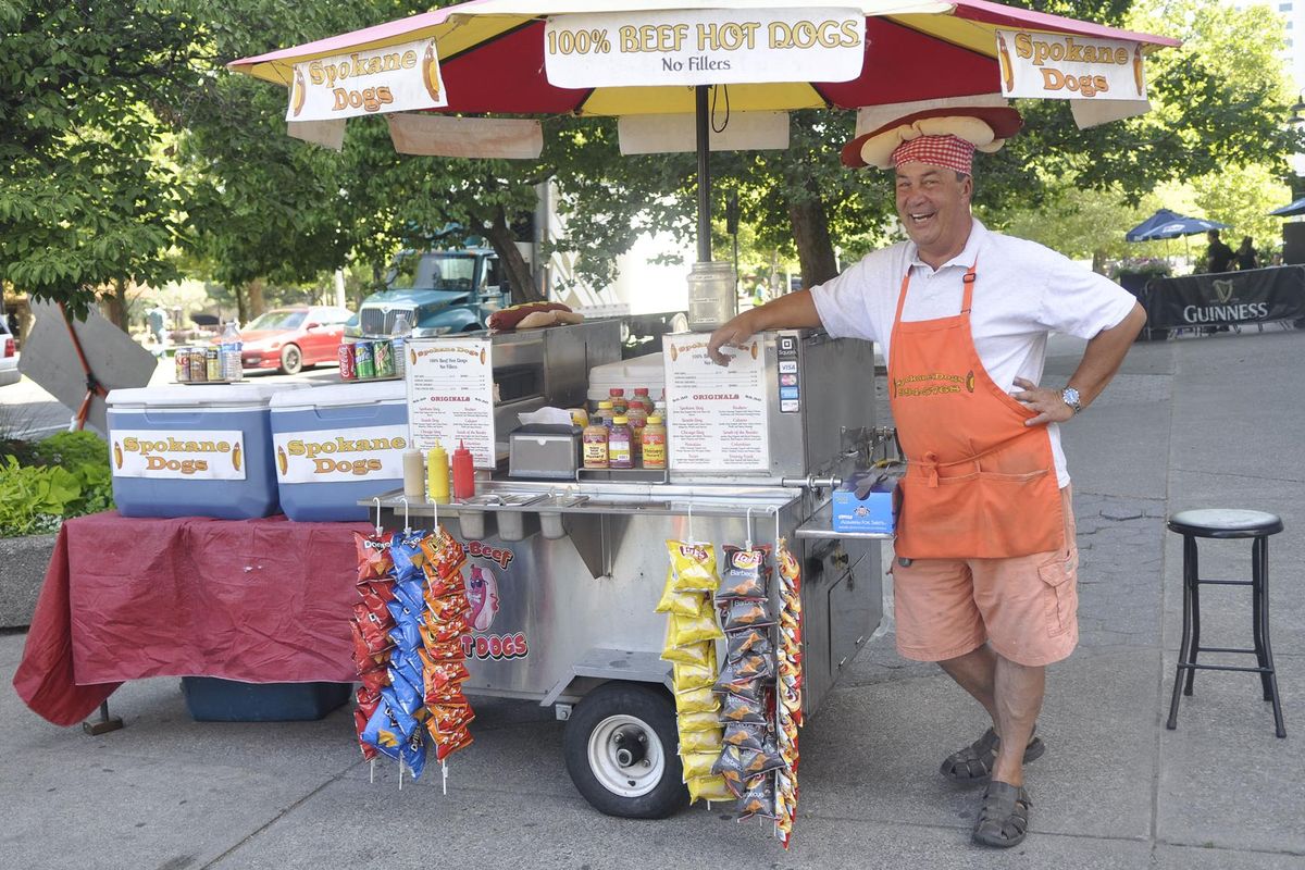 Bob Hetnar, aka Hot Dog Bob, is winding down his fourth season slinging hot dogs at the corner of Howard Street and Spokane Falls Boulevard in downtown Spokane. (Adriana Janovich / The Spokesman-Review)
