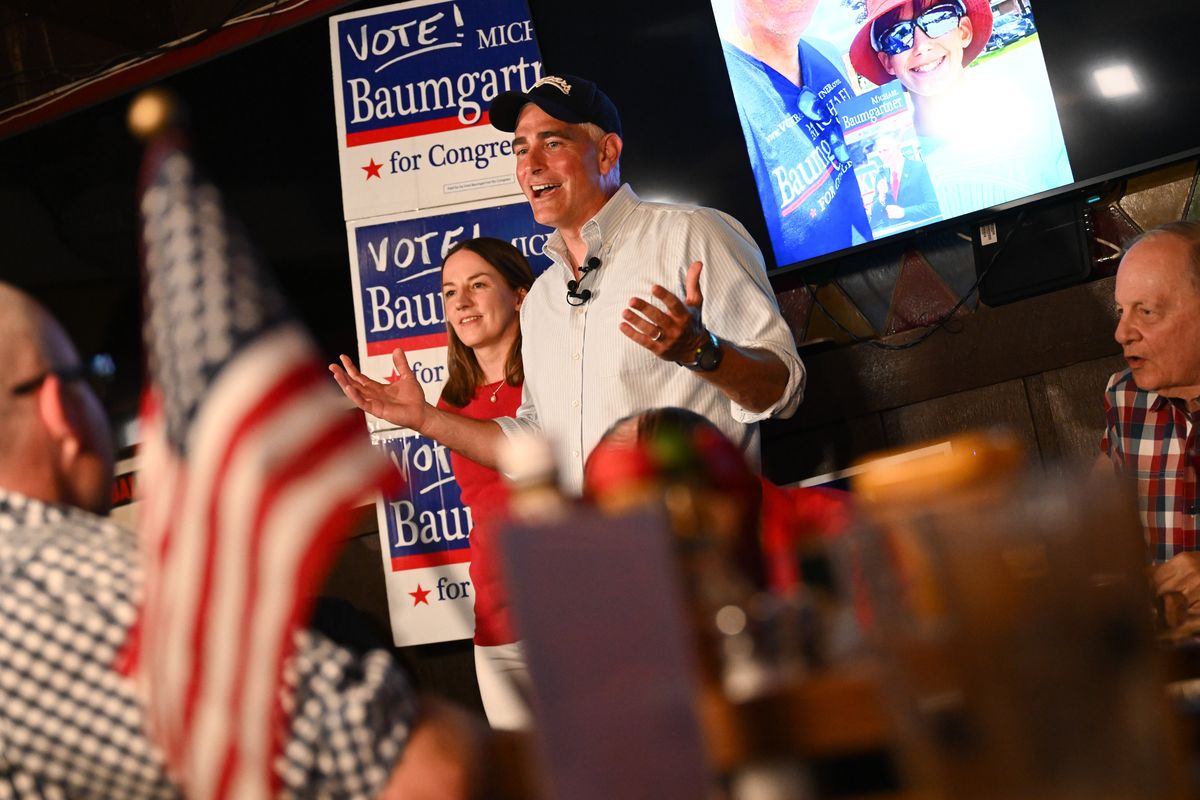 Republican congressional candidate Michael Baumgartner who currently serves as Spokane County Treasurer speaks during a primary election party with his wife Eleanor Baumgartner at his side after their campaign secured the Republican party nomination on Tuesday, Aug. 6, 2024, at The Swinging Doors in Spokane, Wash.  (TYLER TJOMSLAND/THE SPOKESMAN-REVIEW)