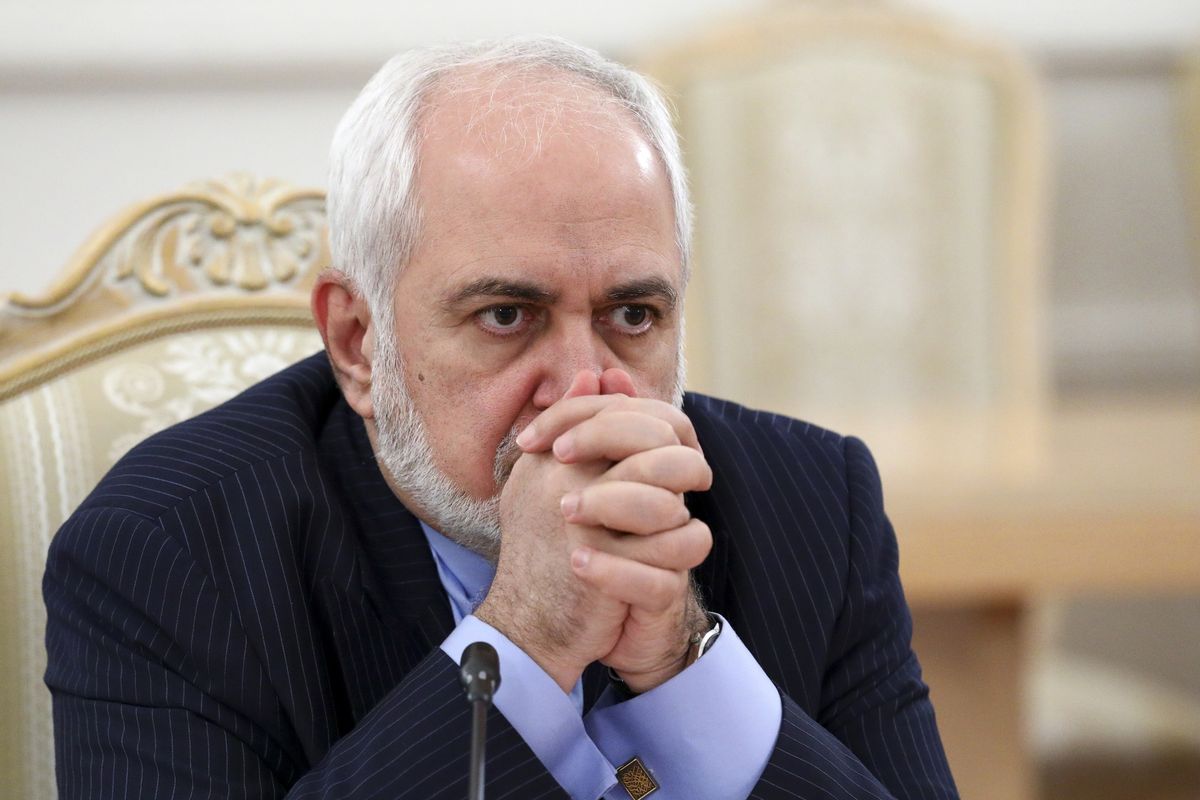 In this Jan. 26, 2021 photo released by the Russian Foreign Ministry Press Service, Iranian Foreign Minister Mohammad Javad Zarif listens during the talks in Moscow, Russia. A recording of Iran