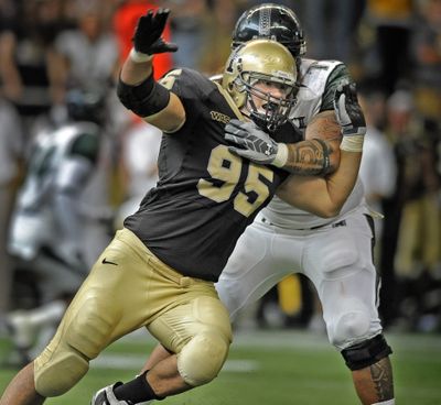 Idaho defensive end Aaron Lavarias gets past a blocker to put pressure on the Hawaii quarterback during their game in the Kibbie Dome on the Moscow campus Saturday October 17, 2009. (Christopher Anderson / The Spokesman-Review)