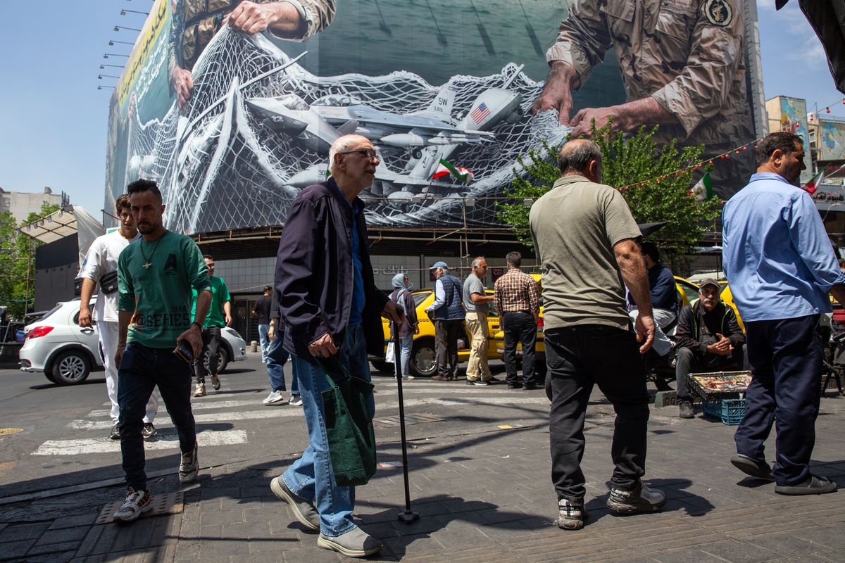 A billboard in Tehran on Tuesday depicts Iranian control of the Strait of Hormuz. Oil prices continued to climb on Tuesday, as peace talks between the United States and Iran appeared at an impasse, with negotiators deadlocked over proposals to reopen the Strait of Hormuz to tanker traffic and restrict Iran’s nuclear program.  (New York Times )