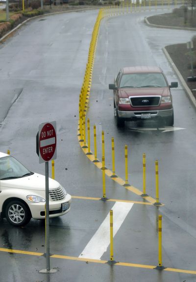 Barriers now help direct vehicles to the parking garage or to drive in front of Terminal C at Spokane International Airport.  (Dan Pelle / The Spokesman-Review)
