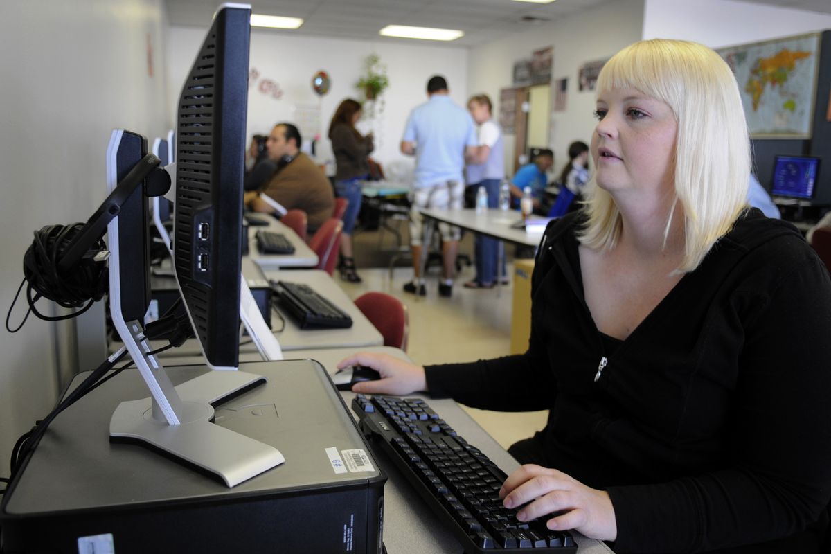 Liz Ward, who dropped out of high school six years ago, said she is motivated to go to college. Ward received her GED from the Community College of Spokane’s Institute for Extended Learning recently. (J. Bart Rayniak / The Spokesman-Review)