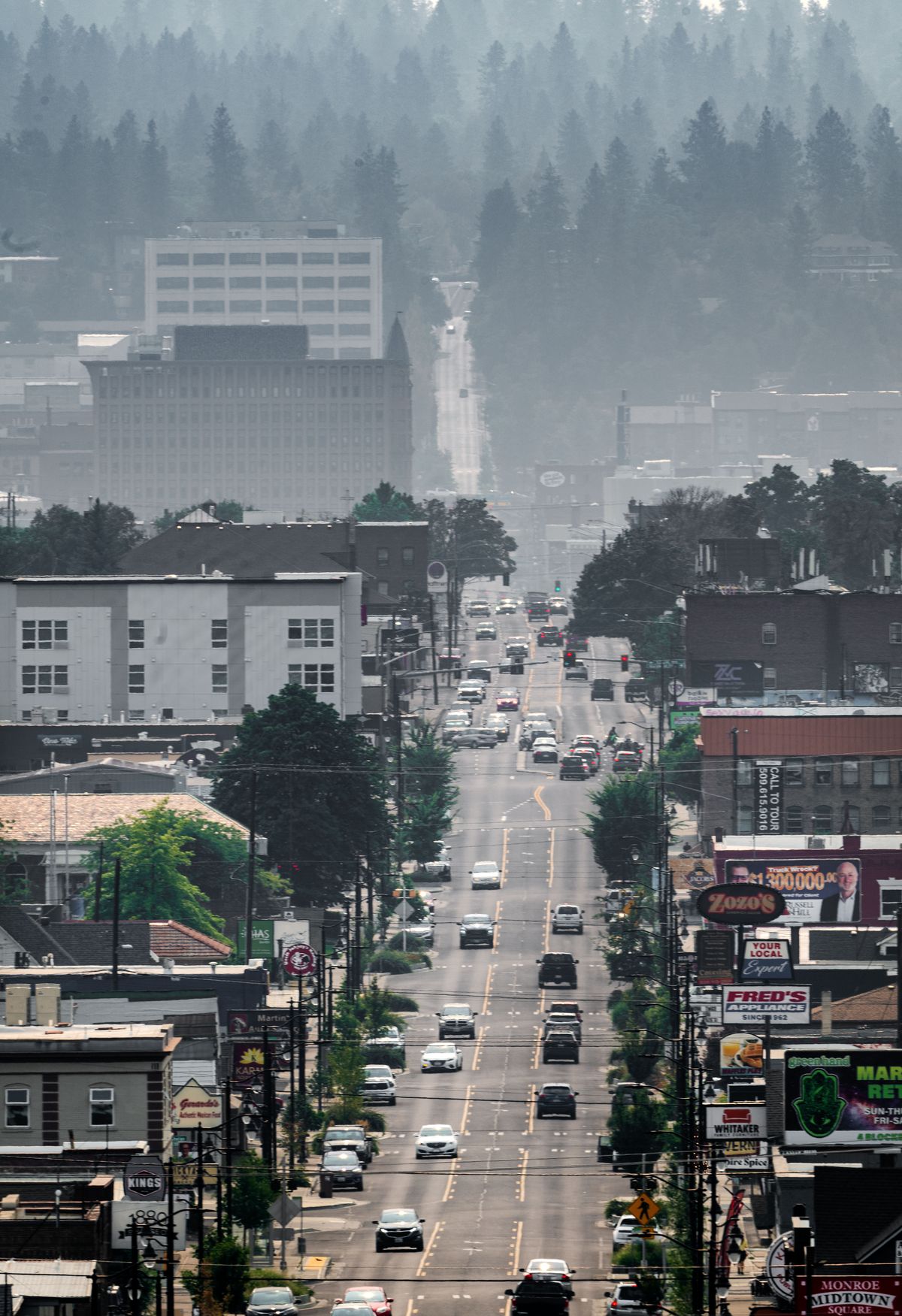 Looking south on Monroe Street last week as smoke from regional wildfires blankets downtown Spokane.  (COLIN MULVANY /THE SPOKESMAN-REVIEW)