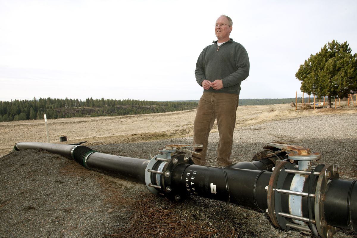 Rich Hanson, city of Spokane Solid Waste Management senior engineer, stands next to the methane-gathering pipes at the Southside Landfill on March 13. Methane production has fallen, making it harder to maintain a gas-destroying flame. (Dan Pelle)