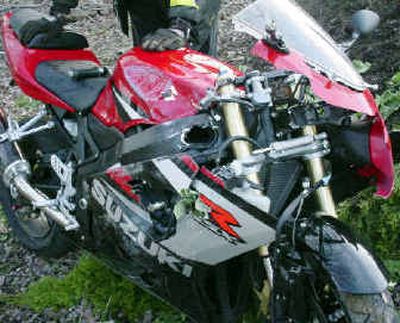 
Kellen Winslow Jr. suffered possible career-threatening injuries when he wrecked this cycle Sunday. 
 (Associated Press / The Spokesman-Review)