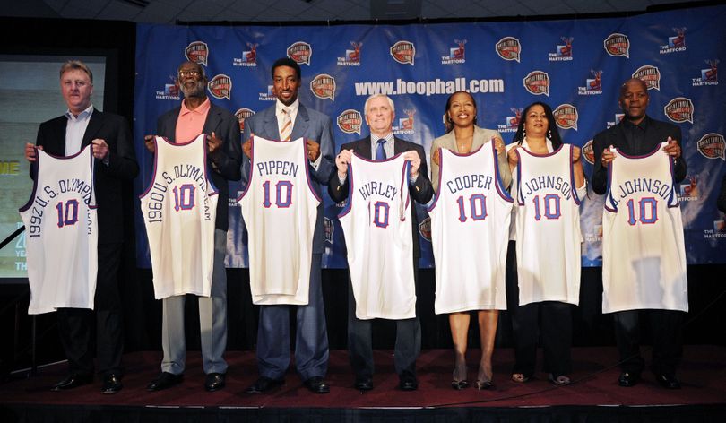 The Naismith Memorial Basketball Hall of Fame class poses with their jerseys, Monday, April 5, 2010, in Indianapolis. Receipients, from left, are Larry Bird who is representing the 1992 USA Olympic team, Walt Bellamy who is representing the 1960 Olympic team, Scottie Pippen, Robert Hurley Sr., Cynthia Cooper, Donna Johnson wife of Dennis Johnson and Terry Johnson, brother of Gus Johnson. (Mark Terrill / Associated Press)