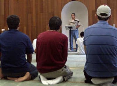 
Washington State University Associate Professor Hesham Abdou leads the weekly community congregation at the Pullman Islamic Center. The center brings together Muslim men and women from the community including many college students. The Spokesman-Review
 (Photos by BRIAN Immel / The Spokesman-Review)