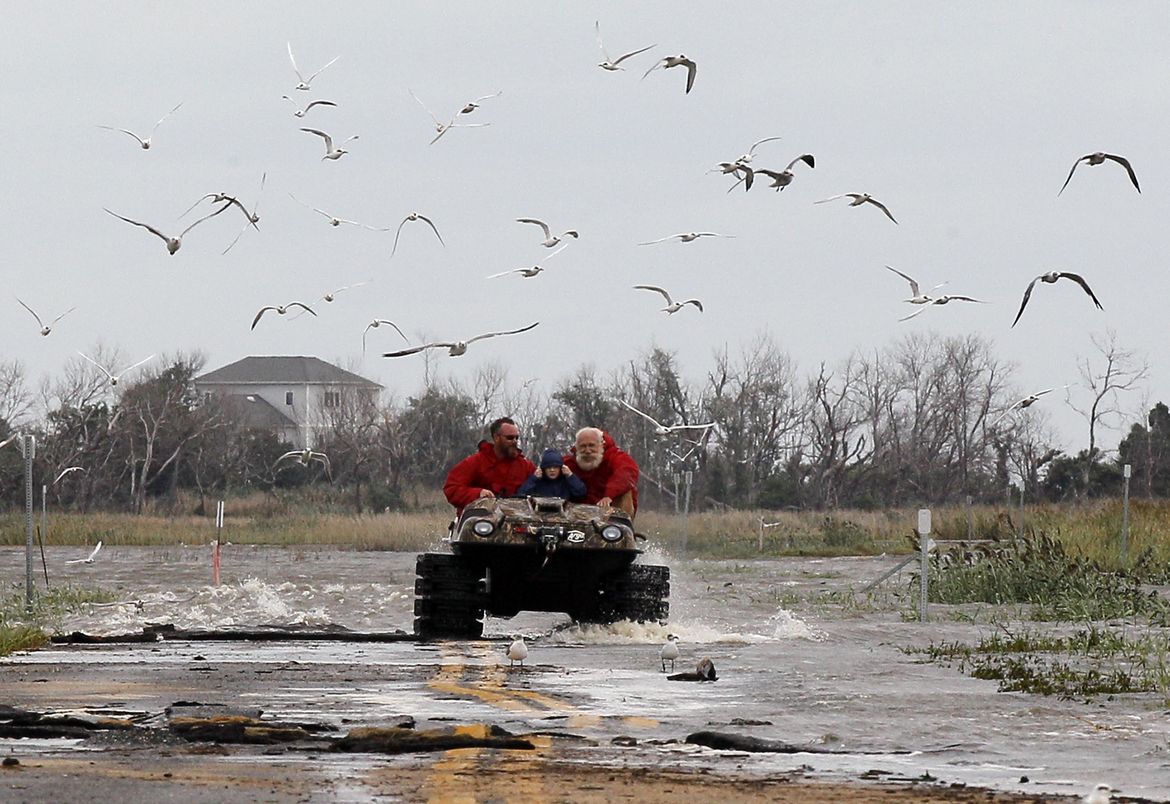 Irene downgraded from hurricane to tropical storm A picture story at