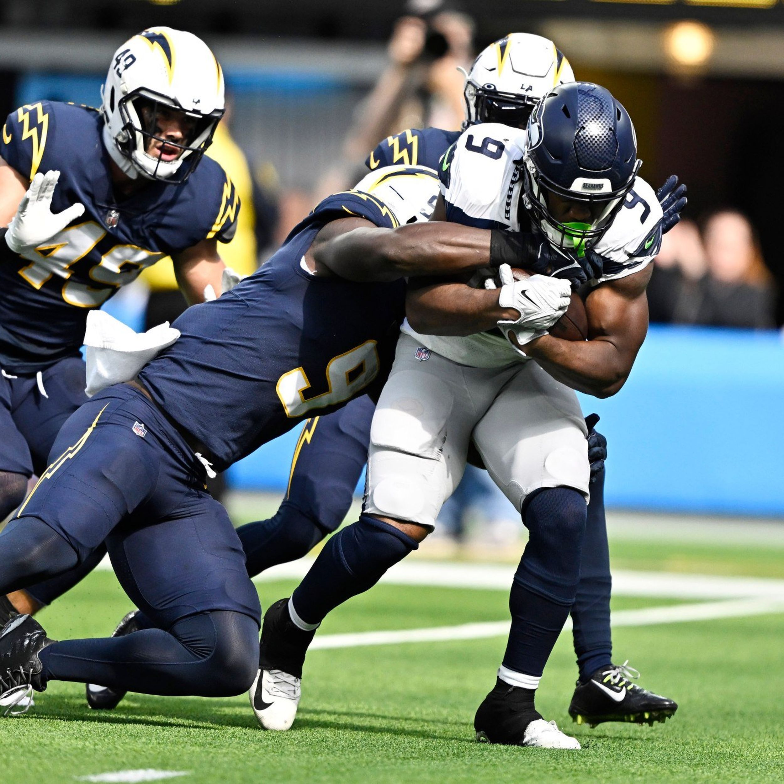 Seattle Seahawks running back Kenneth Walker III (9) runs down the