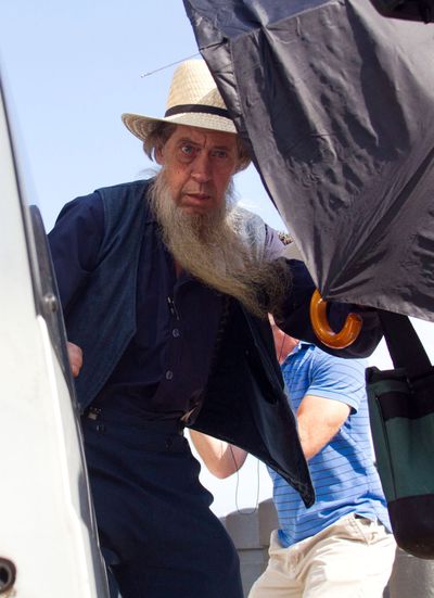 An Amish man boards his transportation vehicle outside the U.S. Federal Courthouse in Cleveland on Thursday, Sept. 20, 2012. The jury found all 16 Amish people guilty in the hair- and beard-cutting attacks against fellow Amish in Ohio. (Scott Galvin / Fr170532 Ap)