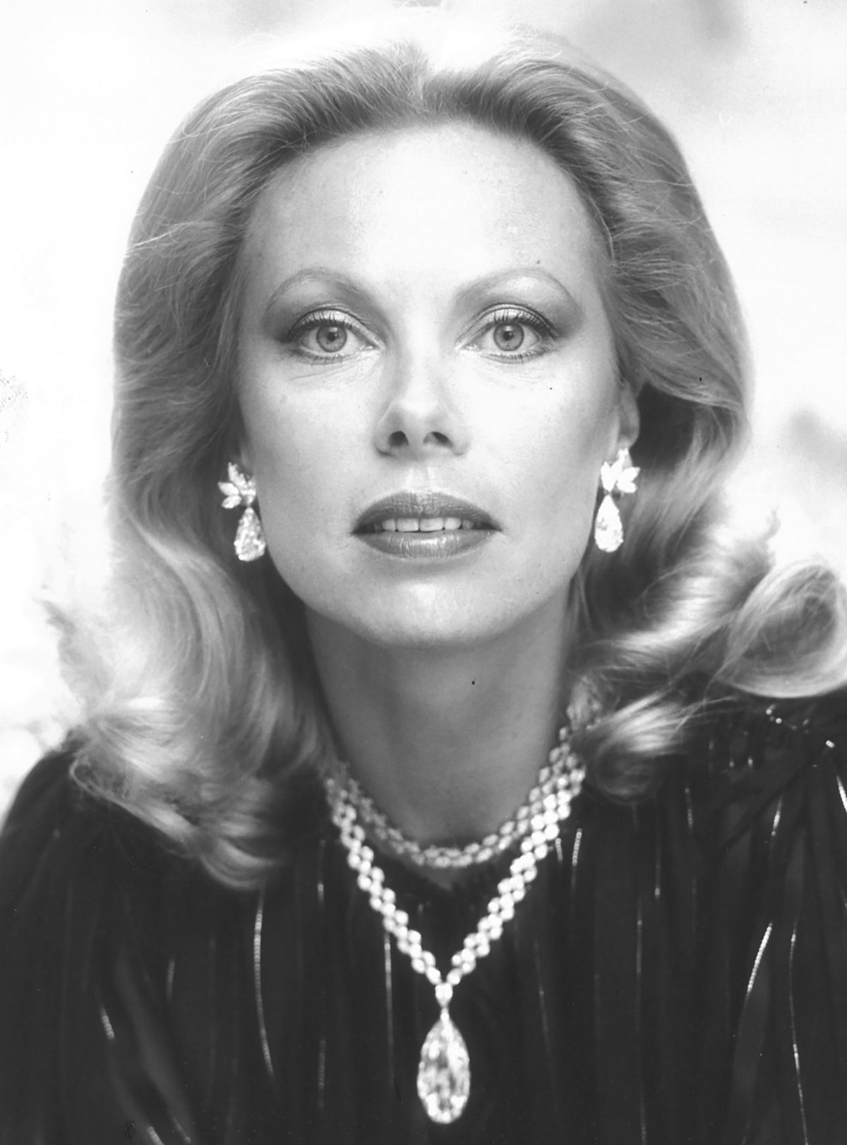 Left: Heidi Horten wears the “Briolette of India,” part of an upcoming auction of the late Austrian heiress’s major jewelry collection. Top: Bulgari sapphire, emerald and diamond earrings which will be part of the auction. Above: A Bulgari sapphire, emerald and diamond necklace in the auction.  (The Heidi Horten Foundation and Christie