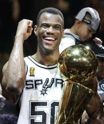 David Robinson holding the NBA Championship trophy in 2003. (Associated Press)