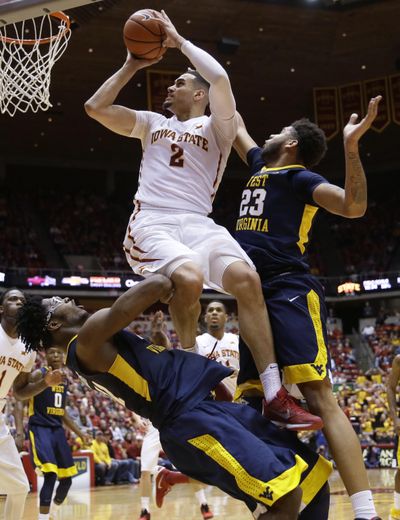 Iowa State’s Abdel Nader is fouled while driving to the basket. (Charlie Neibergall / Associated Press)