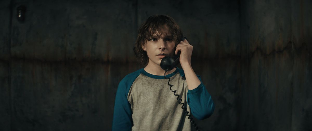 Mason Thames stars as Finney Blake, a kid just trying to make it through middle school in 1978 Denver, in “The Black Phone.”  (Universal Pictures)