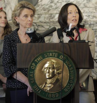 Sen. Maria Cantwell, D-Wash., right, talks to reporters along with Gov. Chris Gregoire, left, Monday, at the Capitol in Olympia about how recently passed health care reform may affect the state of Washington.  (Associated Press)