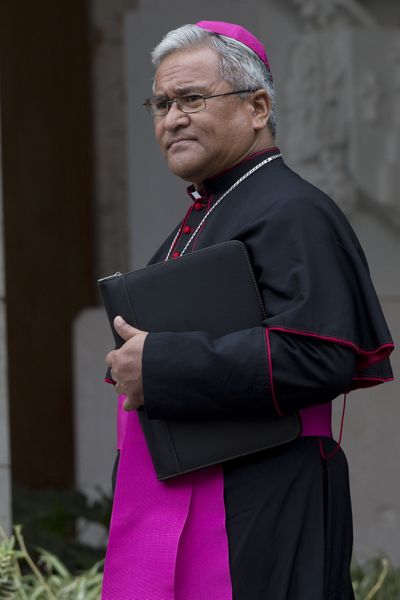 Soane Patita Paini Mafi, archbishop of Tonga, leaves at the end of a morning session of a special consistory Friday at the Vatican. (Associated Press)