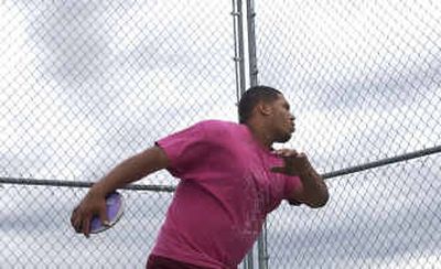 Titan senior Mike Kelley threw more than 160 feet in a discus win and is competing in discus and shot put at the state tournament this weekend.
(Liz Kishimoto / The Spokesman-Review)