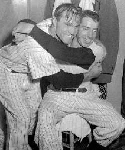 
Joe DiMaggio hugs Hank Bauer, left, after taking the sixth and final game of the 1951 World Series.
 (Associated Press / The Spokesman-Review)