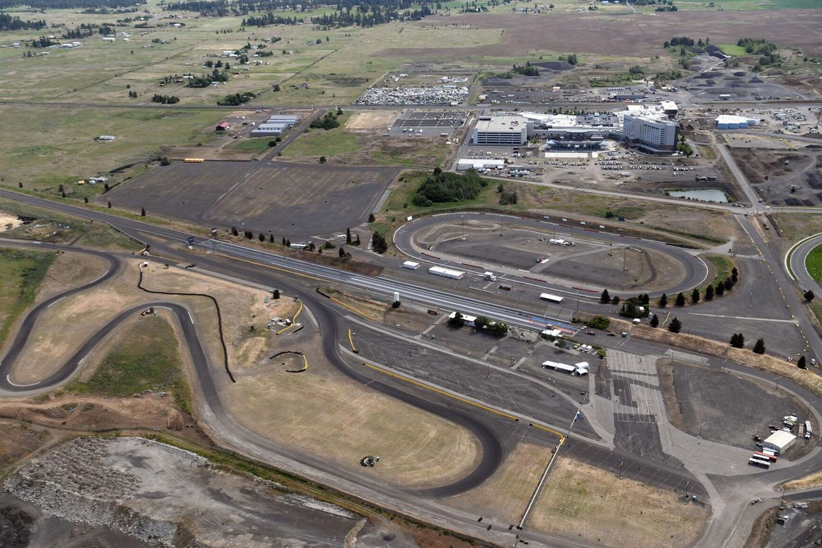In a June 4, 2018, aerial photo, Spokane Raceway Park oval, dragstrip and road course can be seen behind the Northern Quest Casino Resort in Airway Heights.  (JESSE TINSLEY/THE SPOKESMAN-REVIEW)